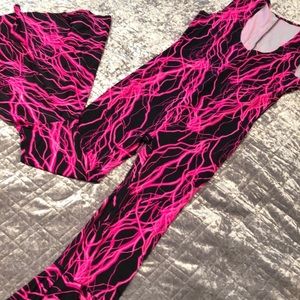 BLACKLIGHT FLARE ONESIE JUMPSUIT